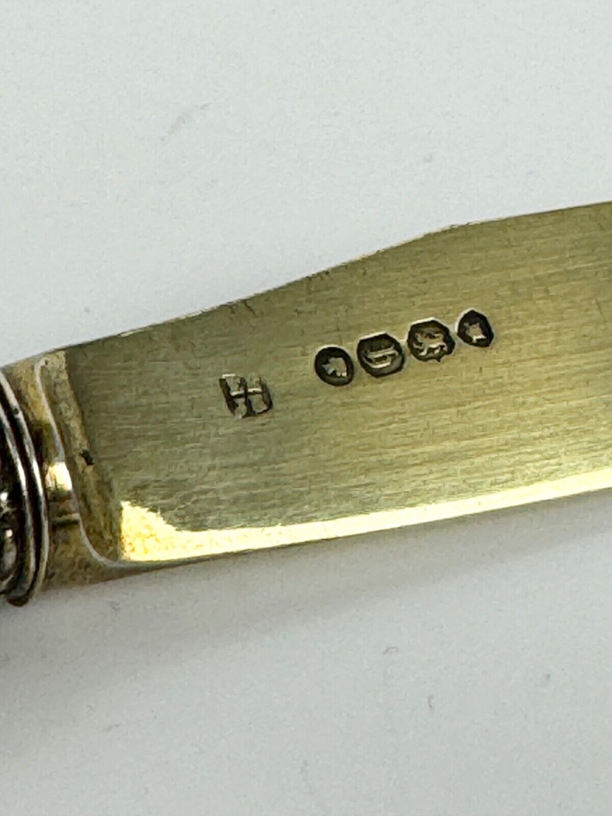 A sterling silver-gilt knife & fork set-the silver c.1863, the porcelain c.1760
