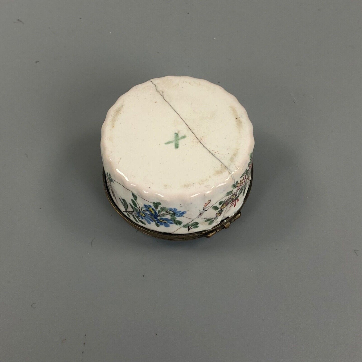 An early 19thc. Continental enamel box. Hand Painted with a boy piper.