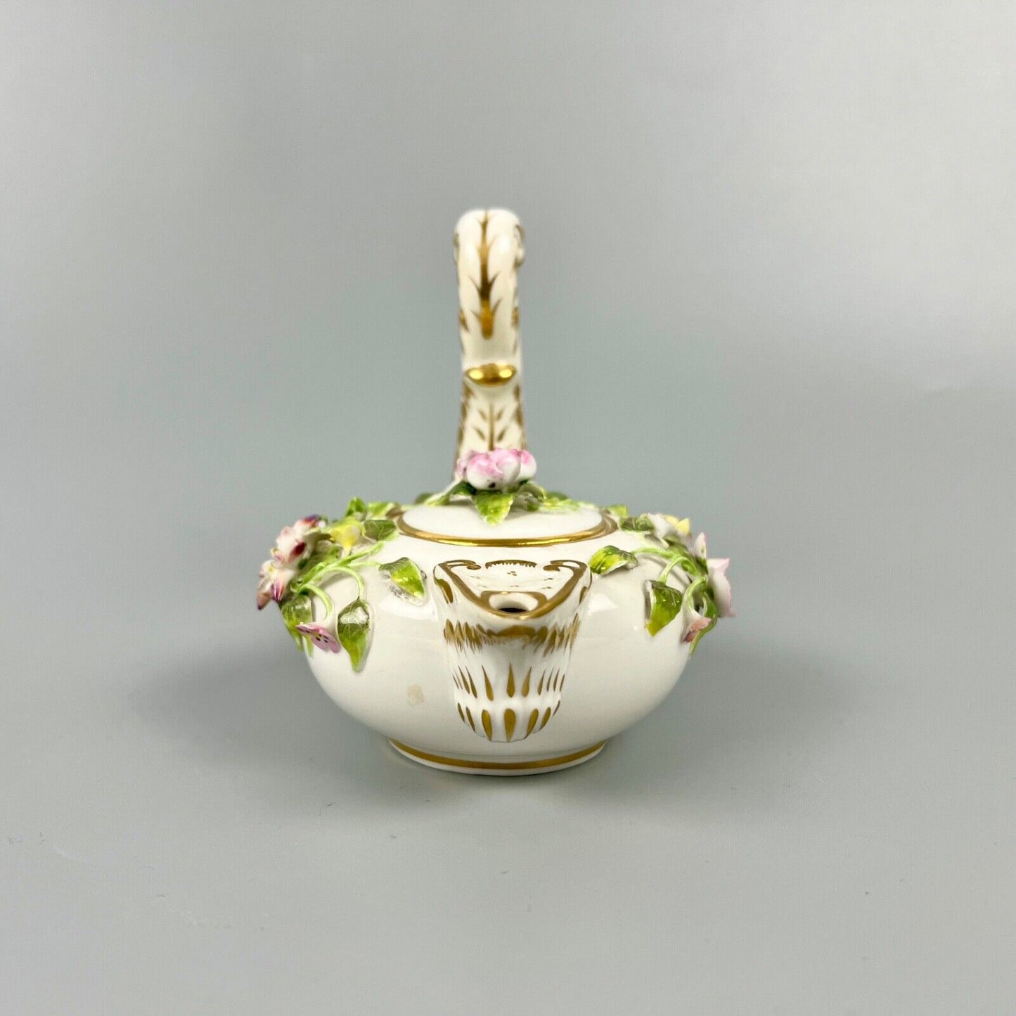 A mid 19thc Derby (Stevenson Hancock-puce version mark) miniature teapot c.1863