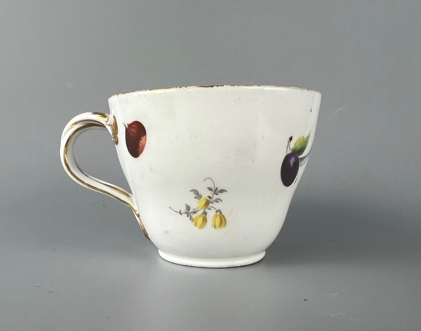 A set of four Meissen Marcolini Period c.1800 bifurcated-handle coffee cups.