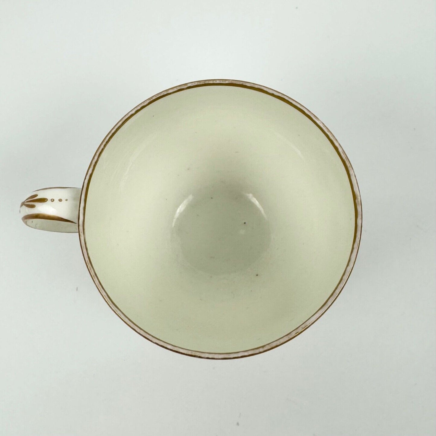 A Pinxton cup and saucer in pattern 174 with painted scenes by Billingsley c1810