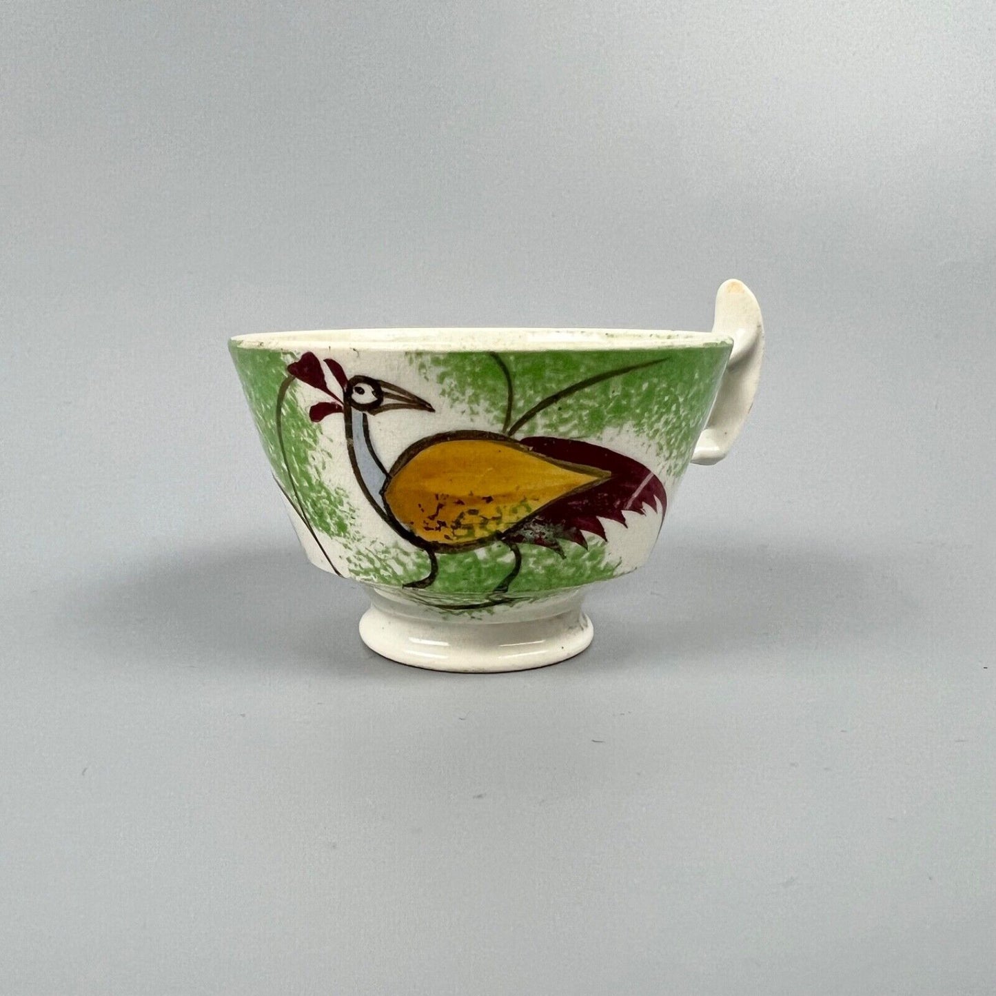 A "Peafowl" pattern (Teardrop in Deike) miniature cup & saucer. c.1820-30