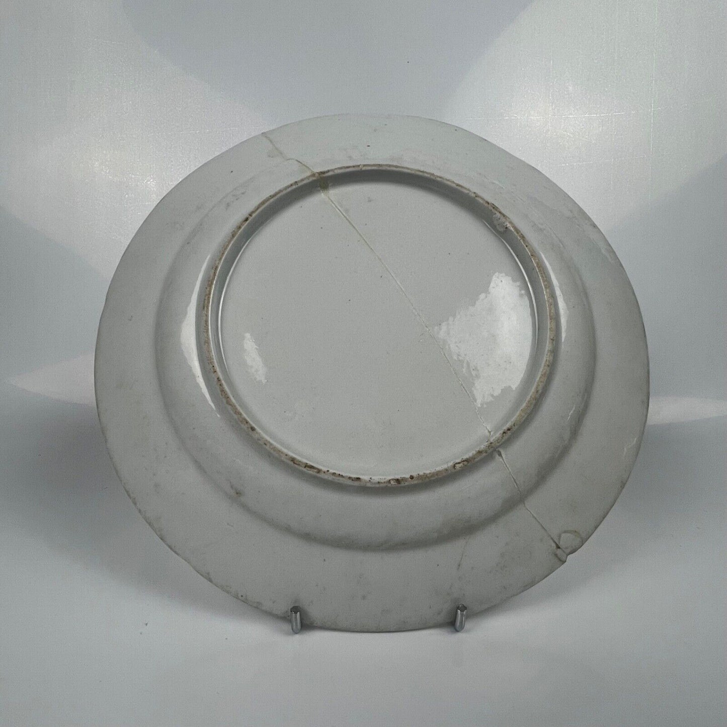 A Derby feather-moulded plate painted with fruit and insects c.1770