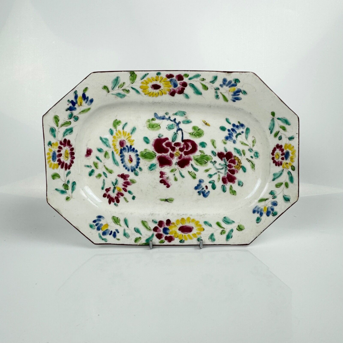A small Bow platter painted in famille rose style c.1750-5