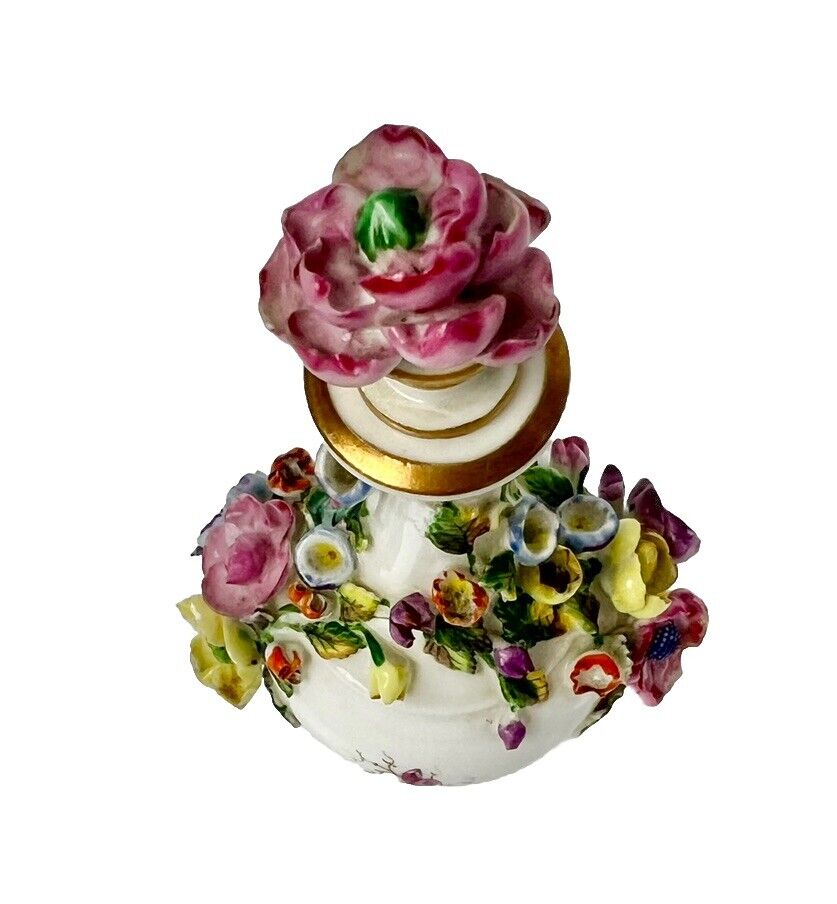 Rockingham porcelain flower encrusted tapered scent bottle. Puce Mark. c.1831-7