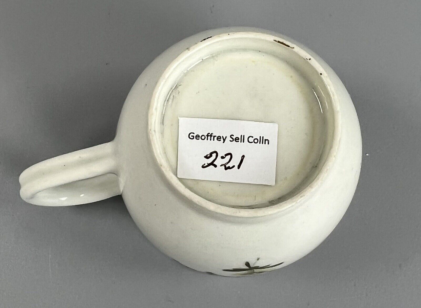 A late 18thc Worcester polychrome coffee cup well painted with floral sprays #5