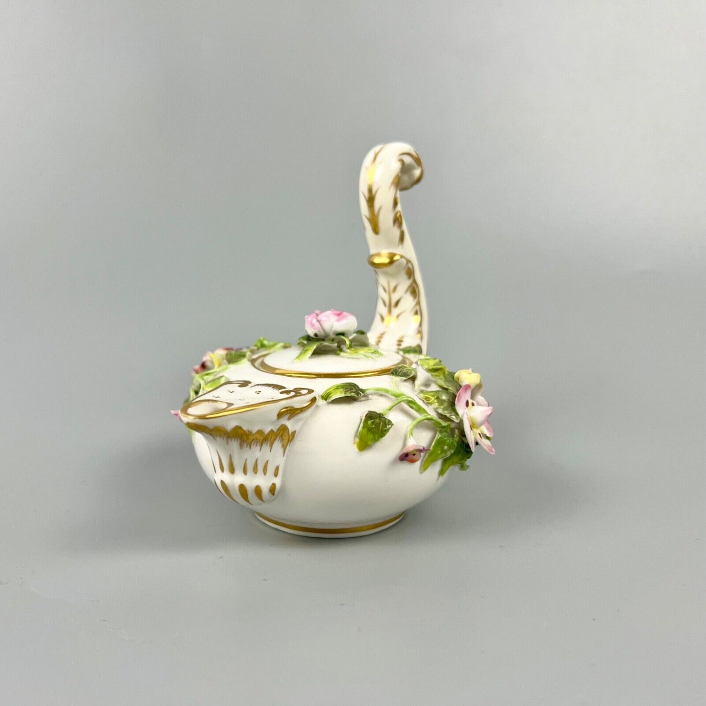 A mid 19thc Derby (Stevenson Hancock-puce version mark) miniature teapot c.1863