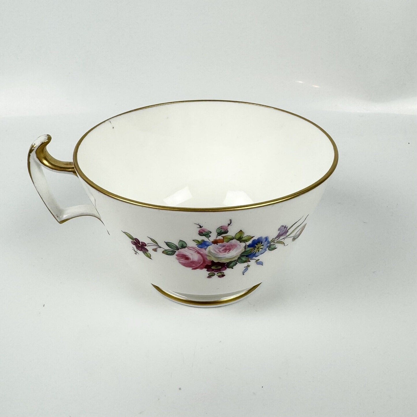 A good Swansea breakfast cup and saucer with floral decoration c1814-7