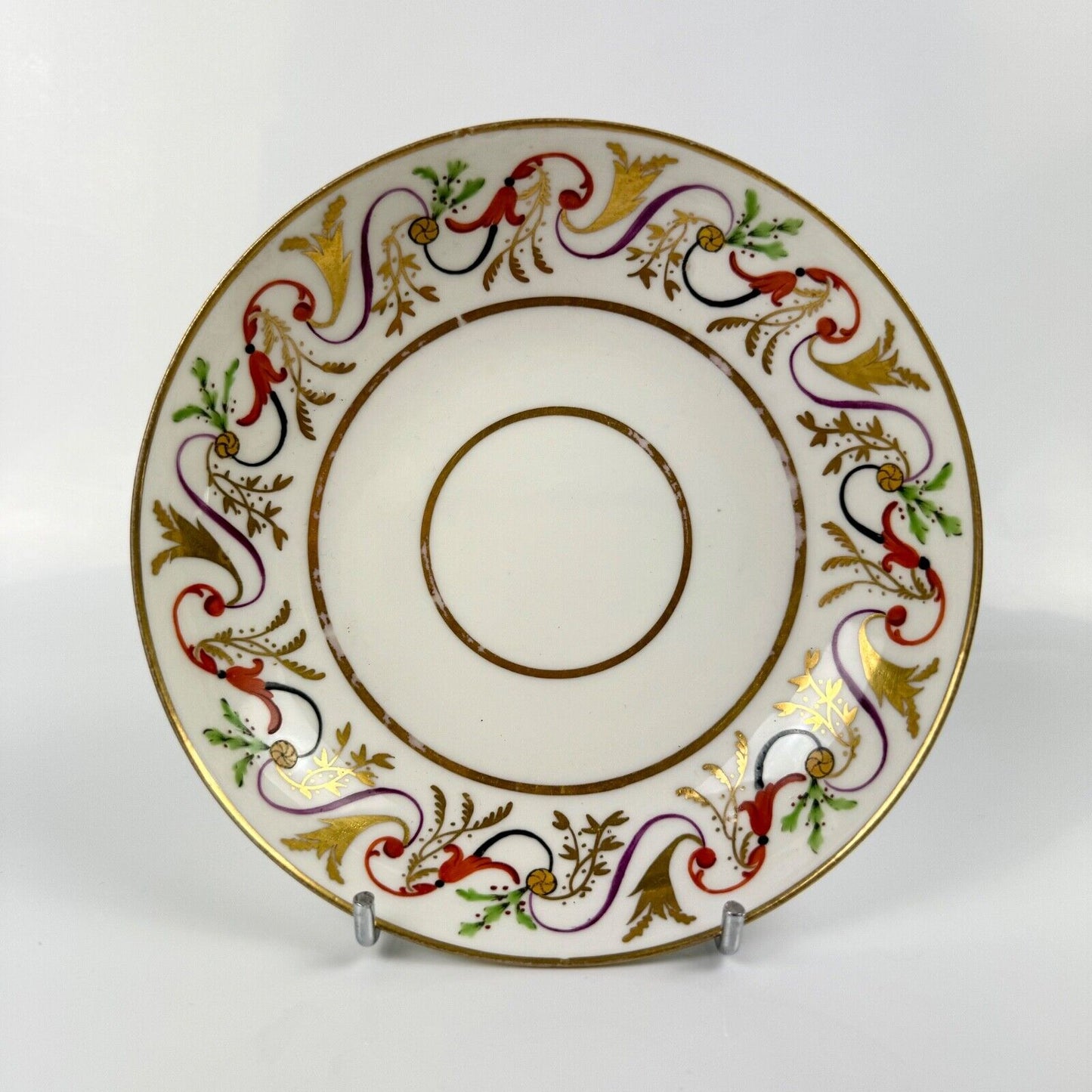 A good Pinxton tea cup and saucer c1796-9 in pattern 301.