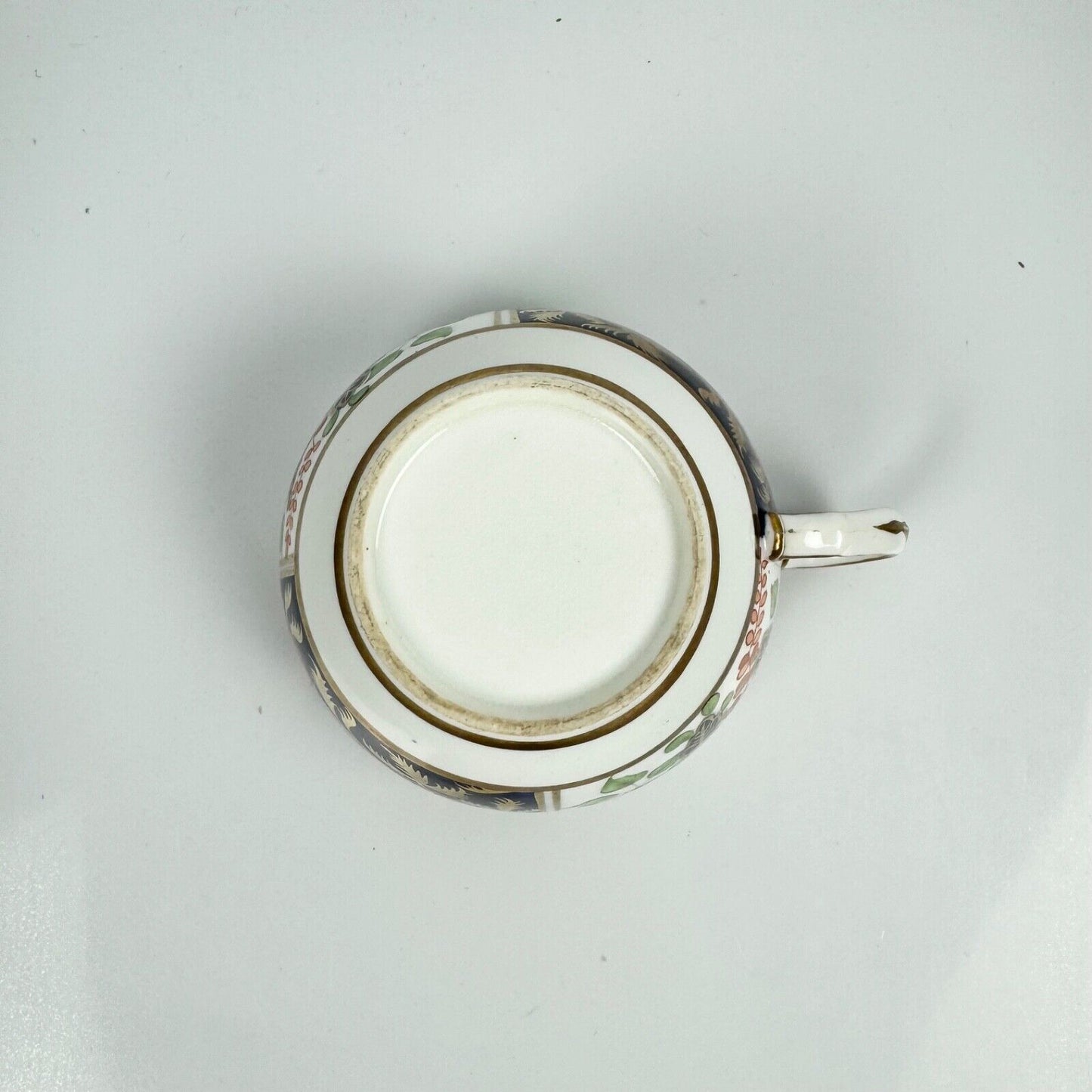 A Spode pattern 1839 teacup, painted in an imari pattern.