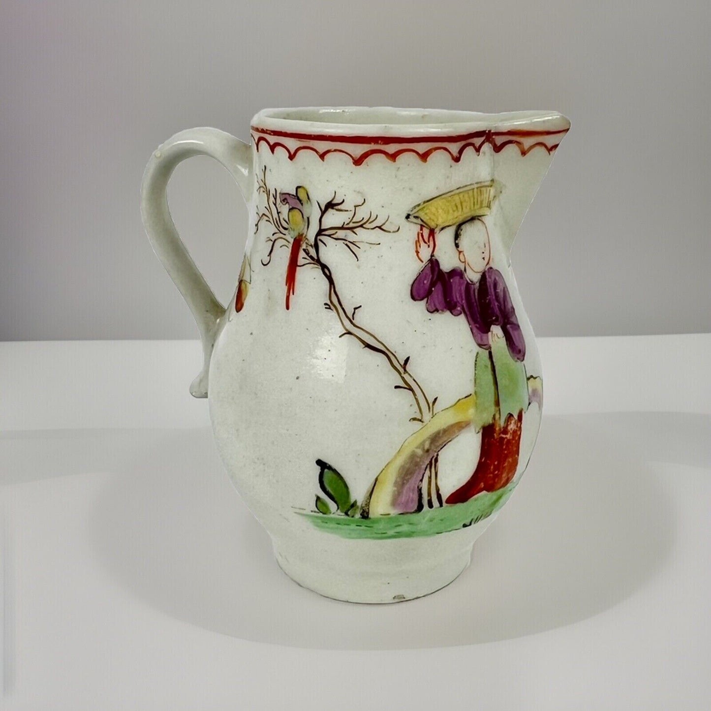 Unusual Lowestoft sparrowbeak creamer painted with a chinoiserie scene c.1770-5