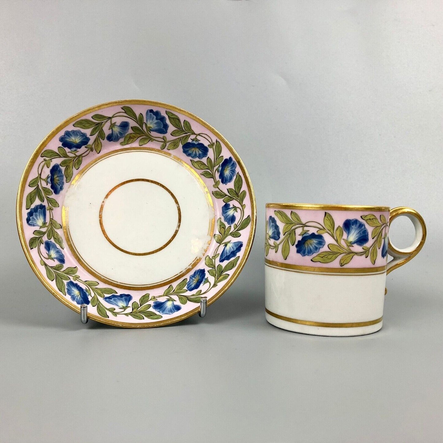 A Barr Worcester coffee can with a floral band on salmon ground c.1795-1805