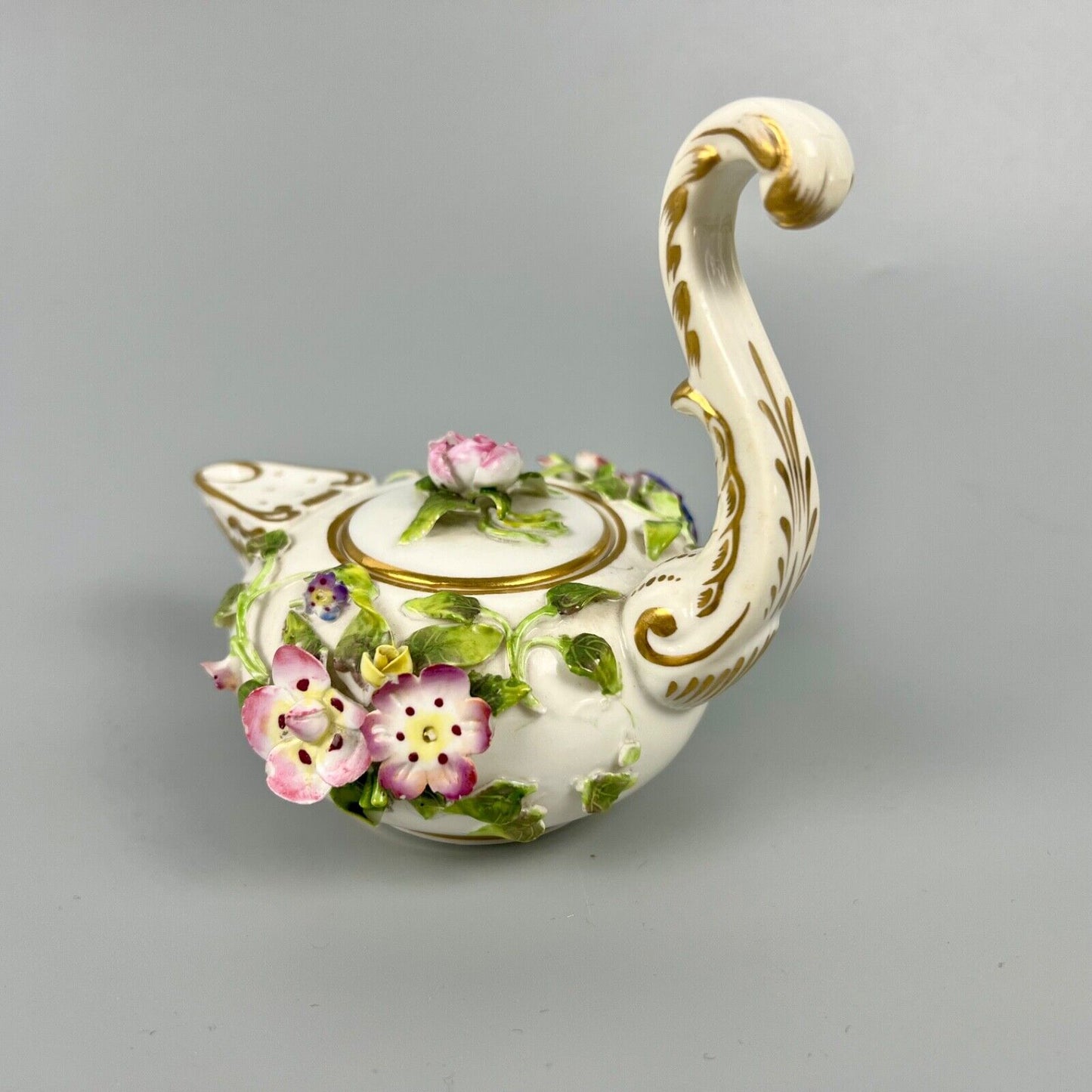 A mid 19thc Derby (Stevenson Hancock-puce version mark) miniature teapot c.1863