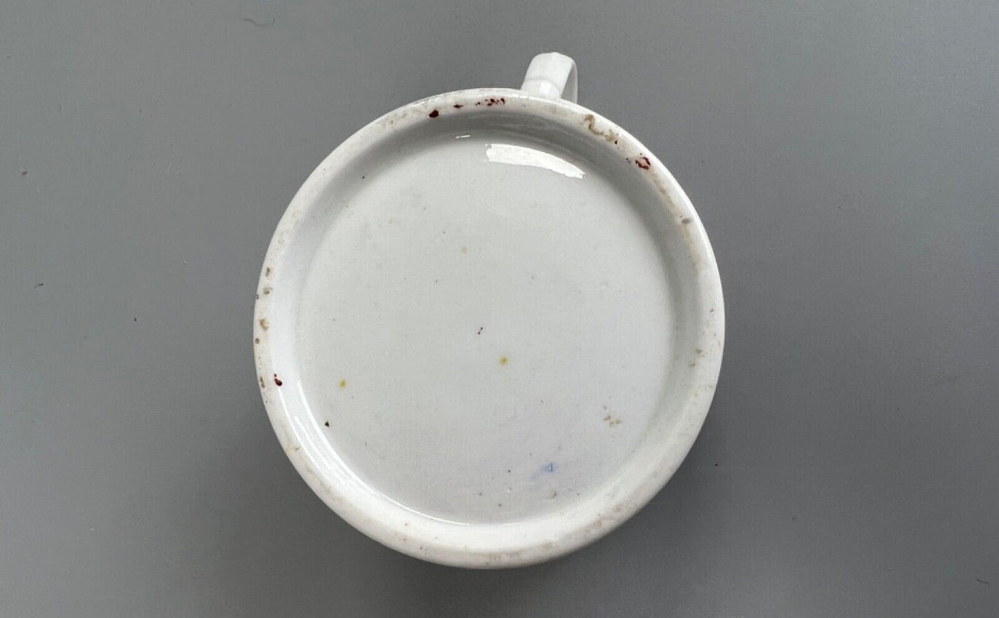 An early 19thc Coalport coffee can with silver lustre decoration.