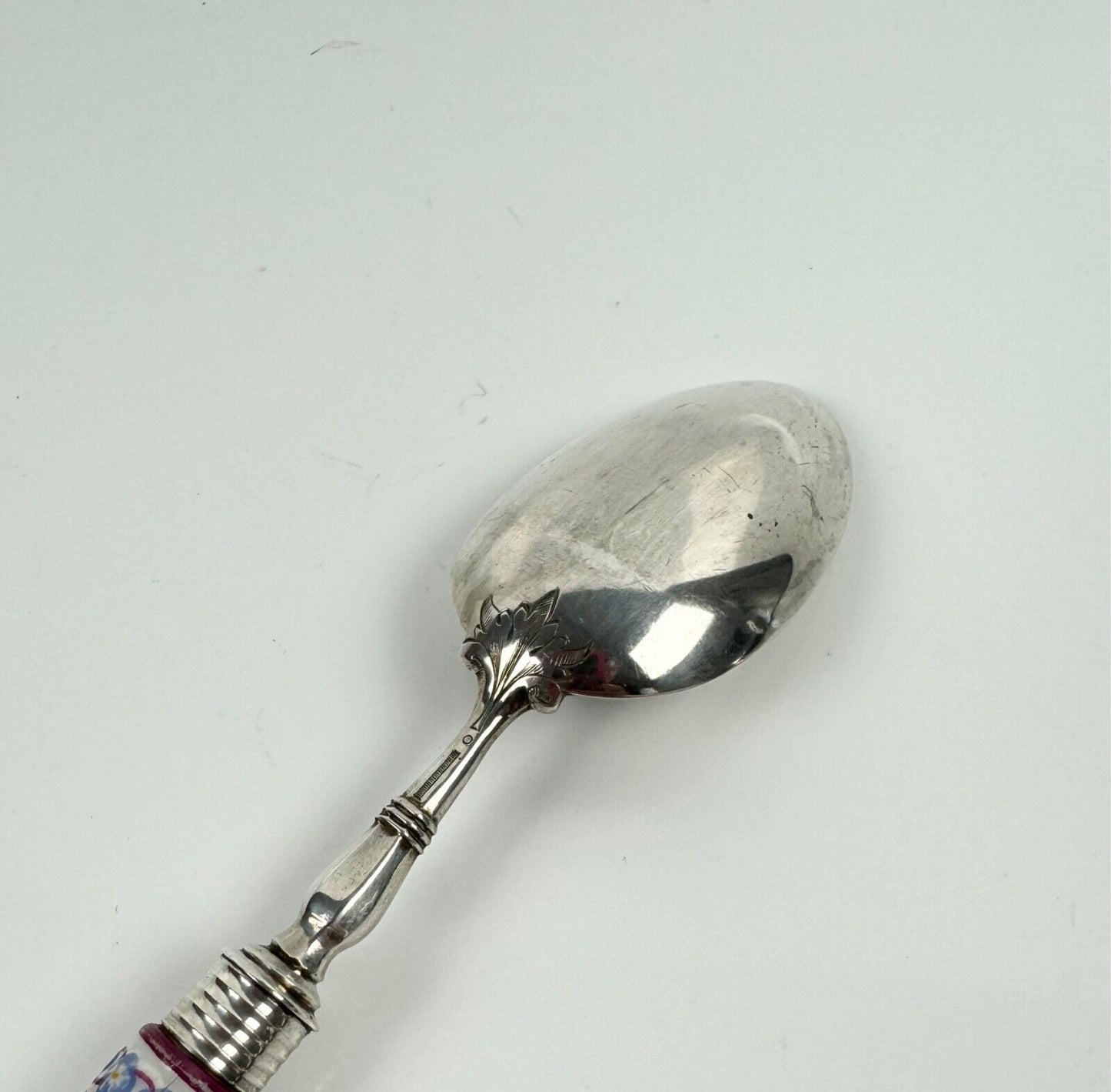 A sterling silver knife fork & spoon set-the silver c.1840, the porcelain c.1760