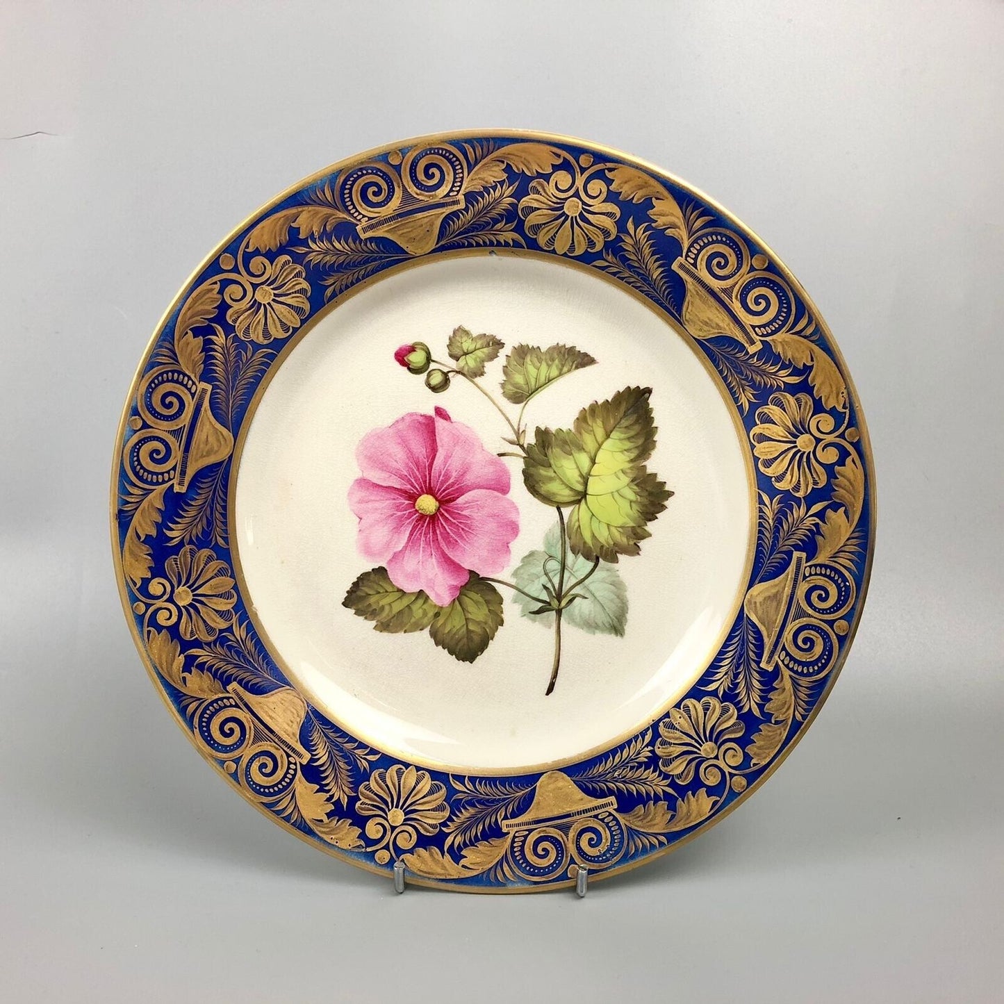 A Quaker Pegg-Painted Derby Plate With Seringapatum Hollyhock Study. c1813-15.