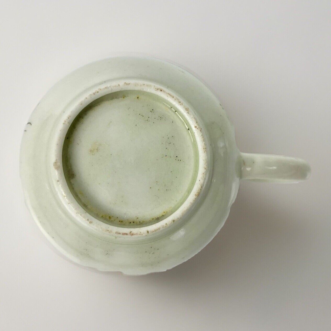 A c.1765-75 Liverpool Philip Christian polychrome floral painted coffee cup