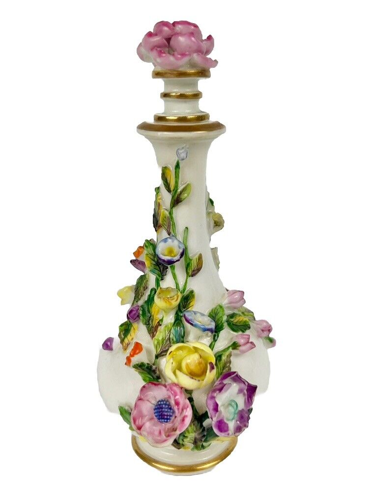 Rockingham porcelain flower encrusted tapered scent bottle. Puce Mark. c.1831-7