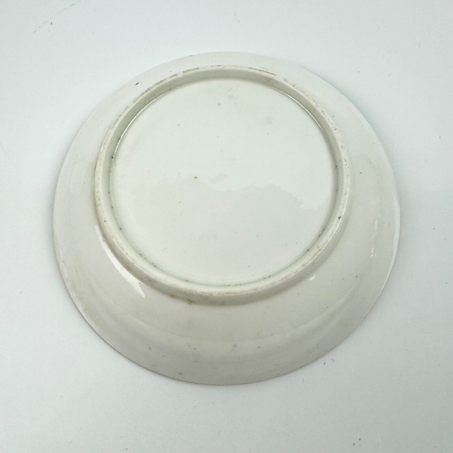 A good Pinxton tea cup and saucer c1796-9 in pattern 301.