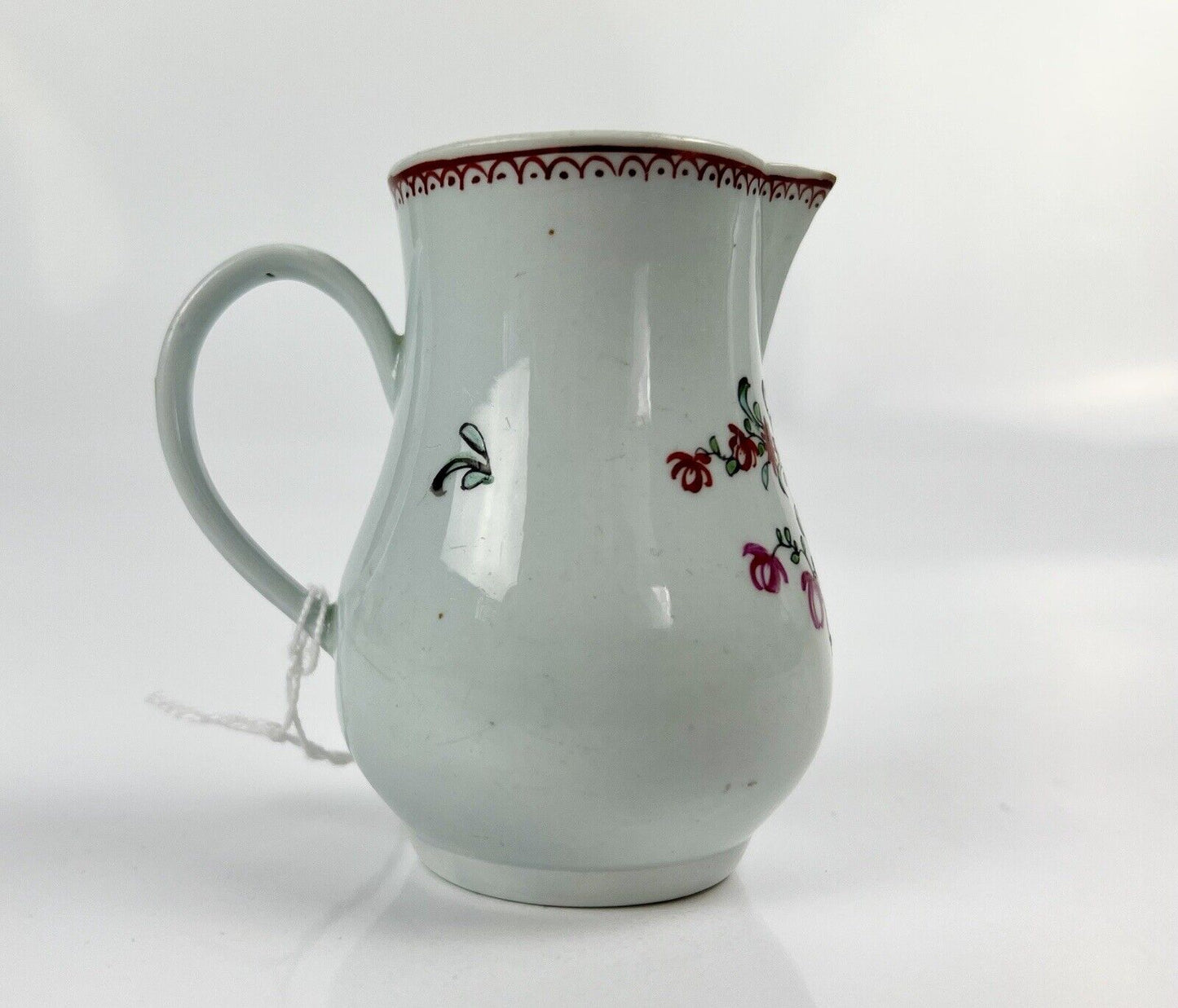 A Philip Christian Liverpool floral-decorated sparrowbeak jug. c.1770