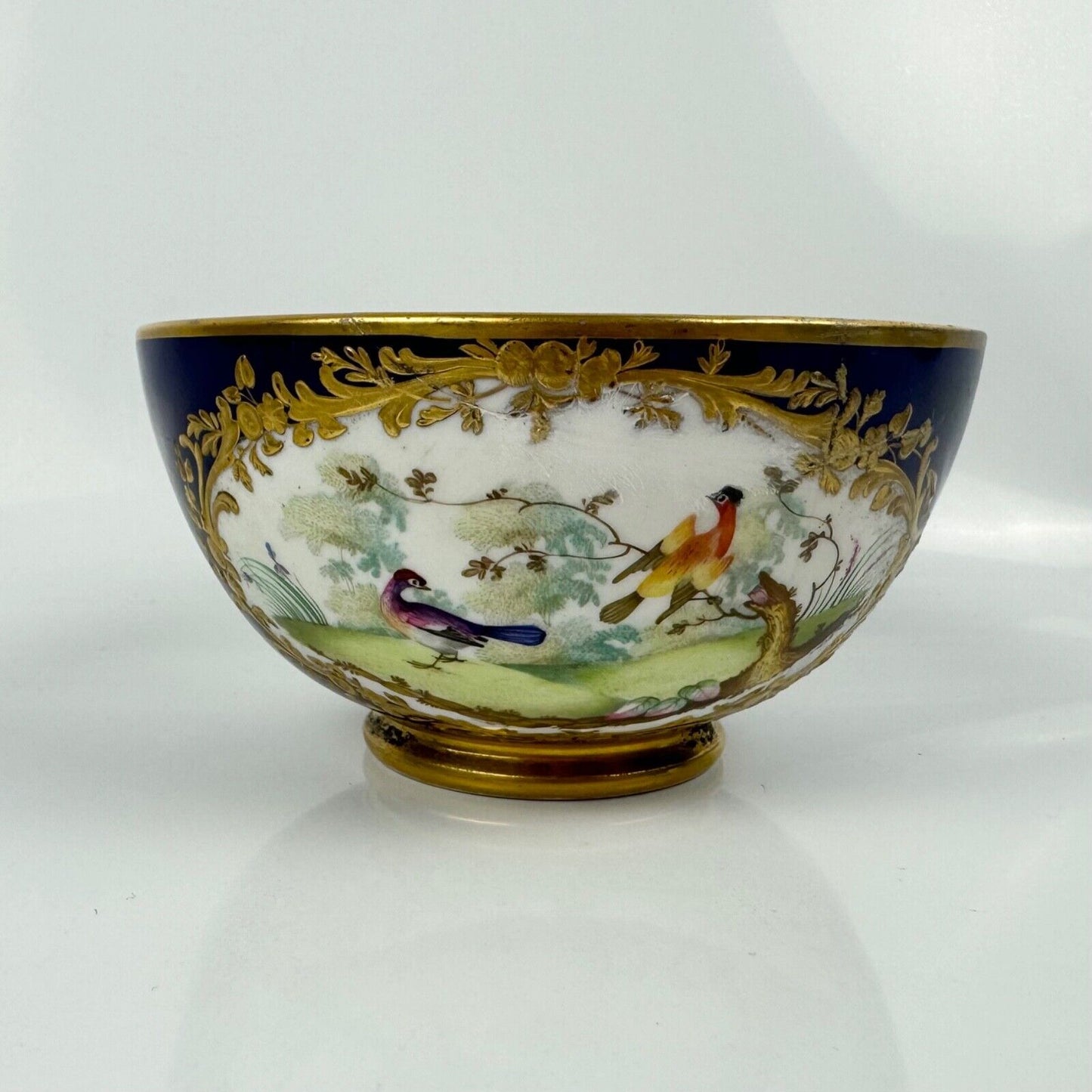 A Sèvres-style Derby bowl painted with exotic birds. Mock Sèvres mark. c.1835-40