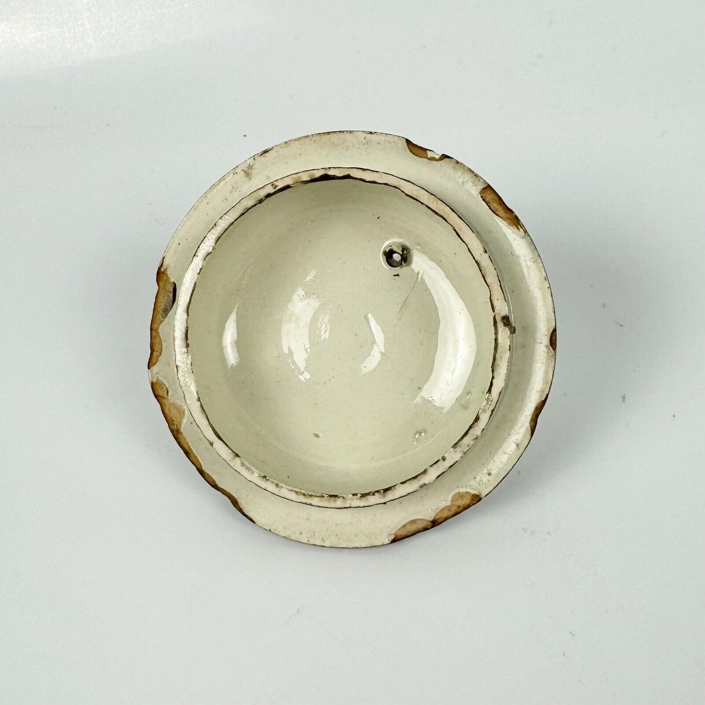 A Staffordshire c1790 hand-painted with a chinoiserie scene pearlware teapot.