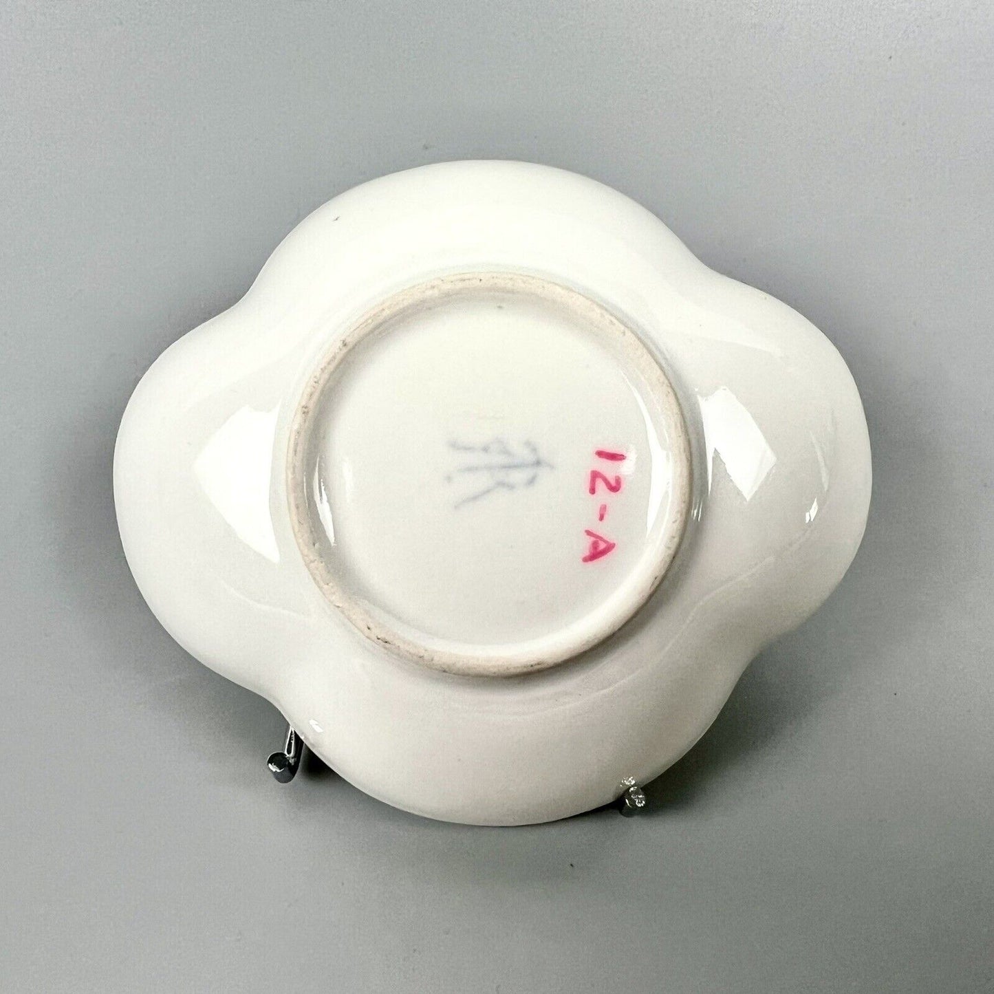 Dresden quatrefoil teacup & saucer painted with romantic scenes. 'AR' mark c1880