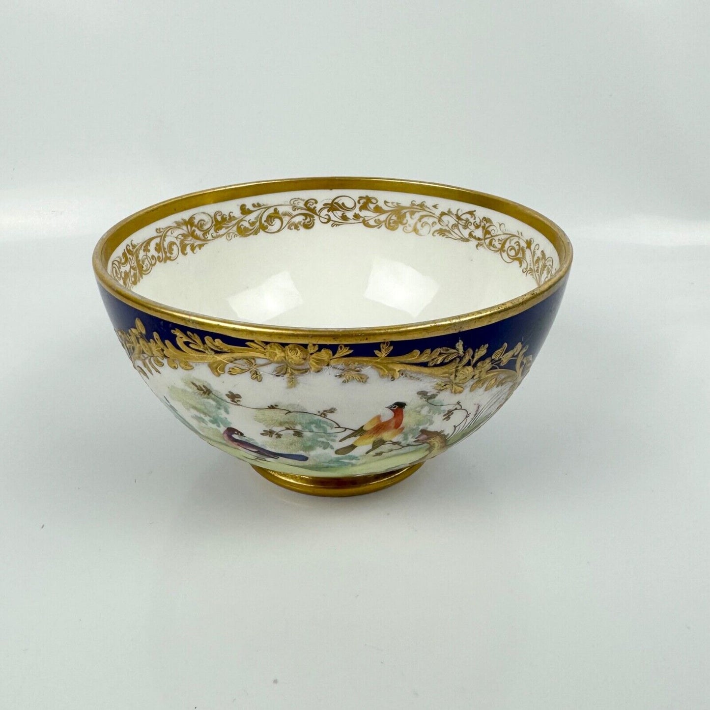 A Sèvres-style Derby bowl painted with exotic birds. Mock Sèvres mark. c.1835-40