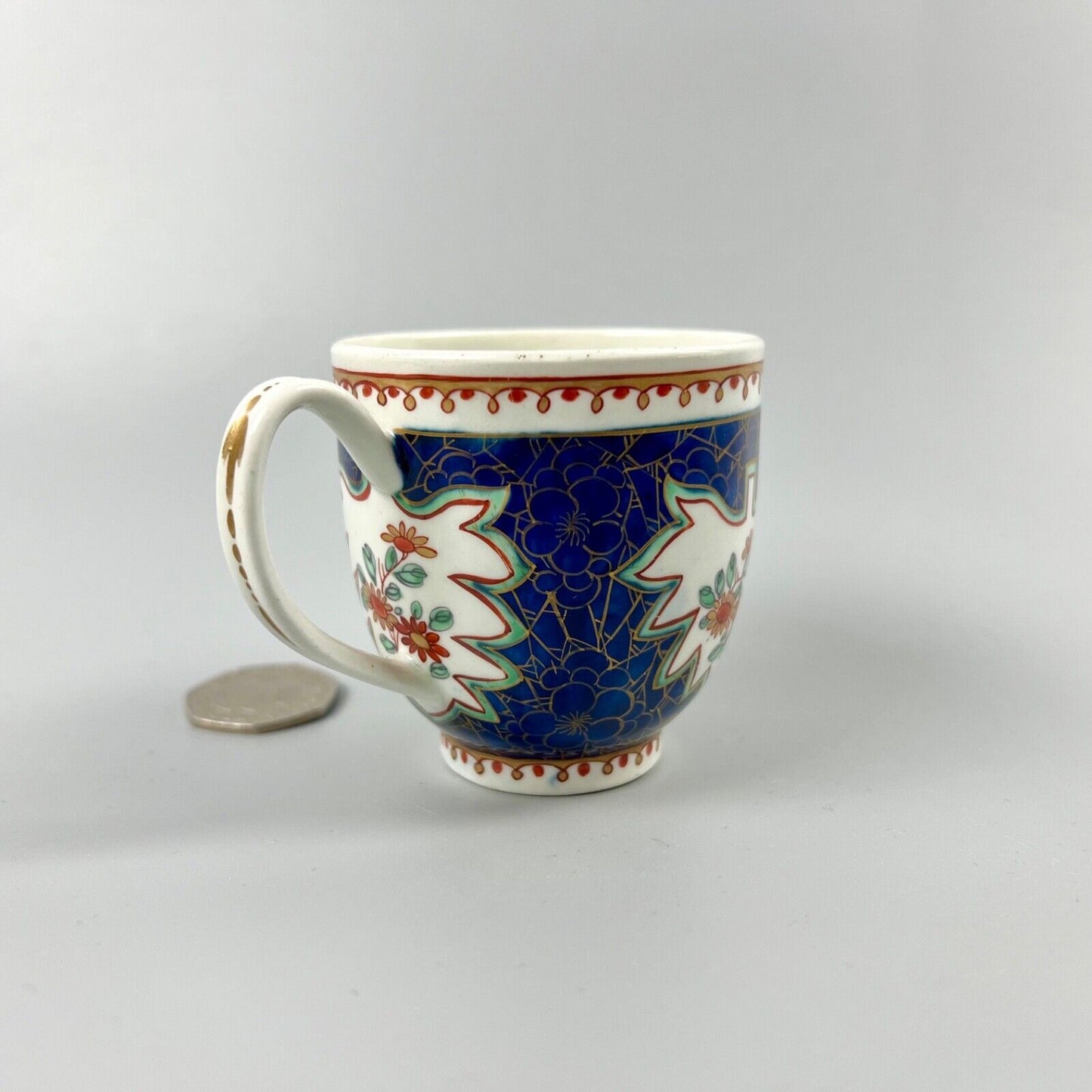 A rare 1st Period Worcester coffee cup in an unusual pattern c.1765-70