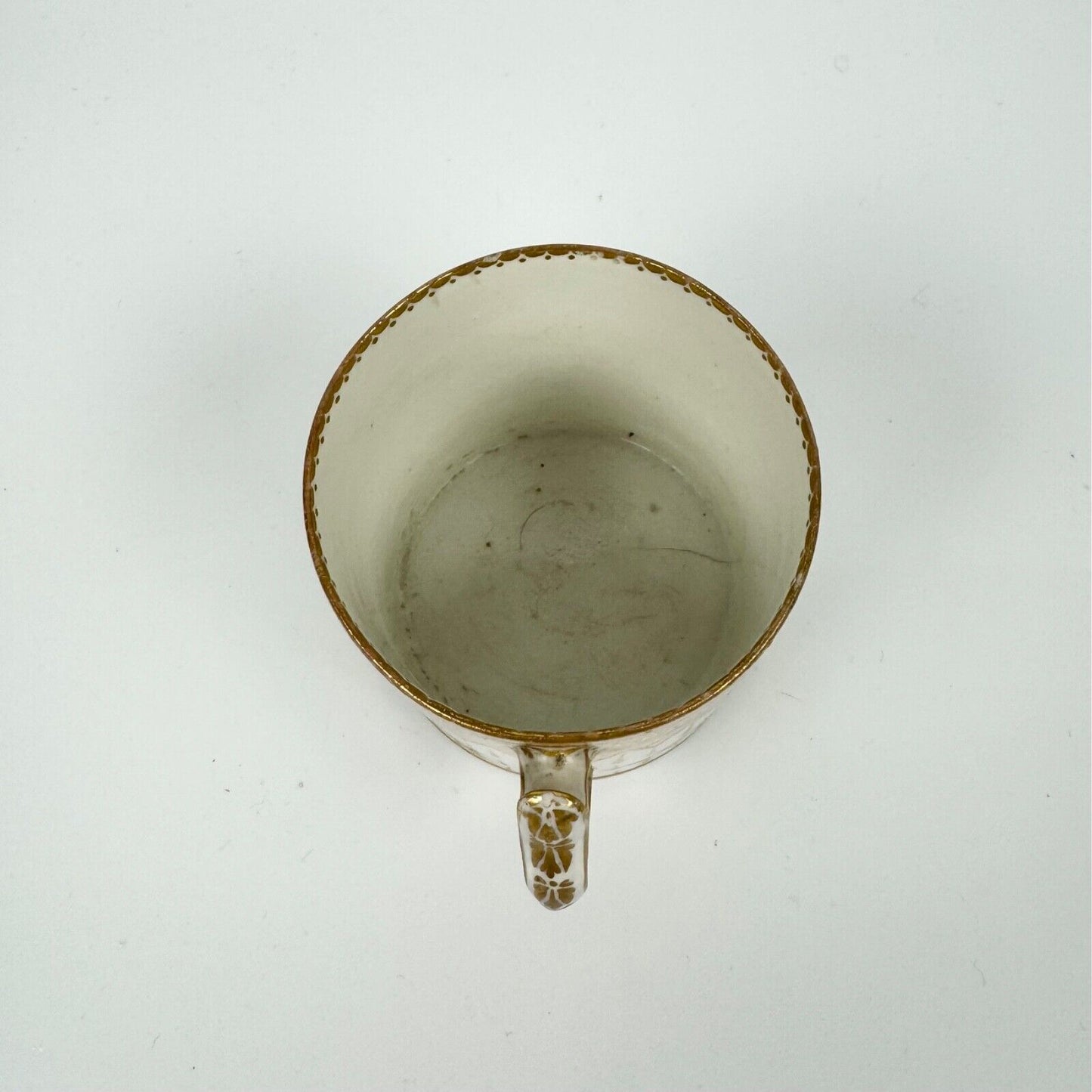 A Derby cabaret can and saucer, circa 1795. Pattern 119. Unusual handle.