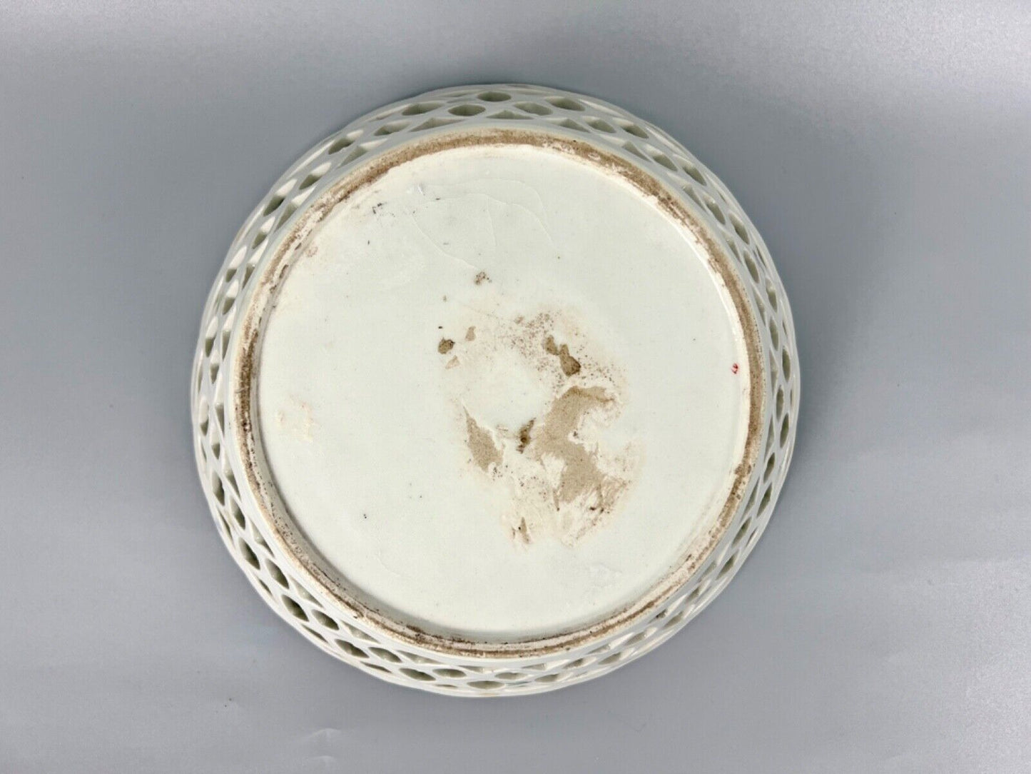 A pair of large Bow porcelain famille rose reticulated baskets c.1752