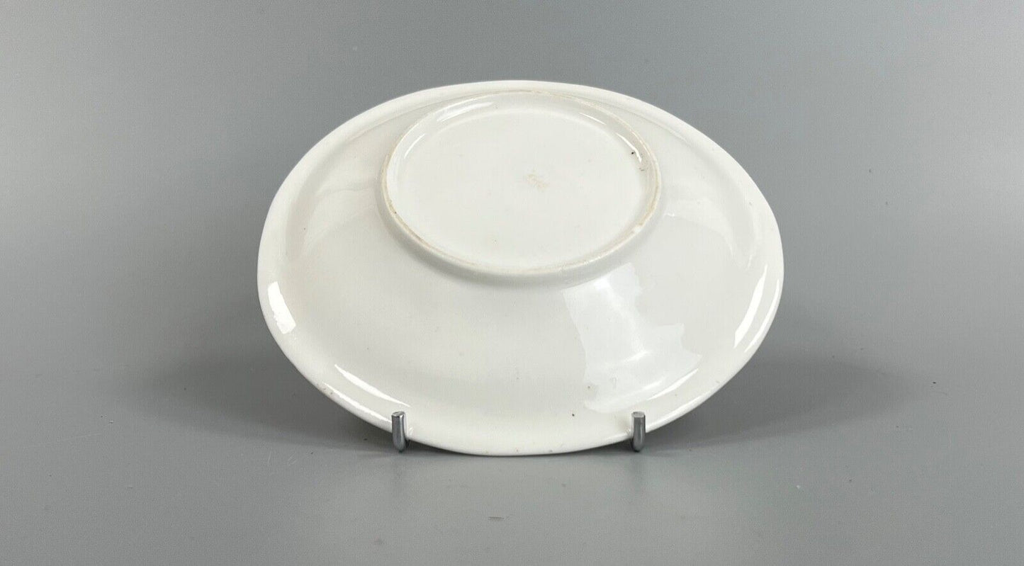 An early 19thc New Hall tea cup and saucer in pattern number 3203