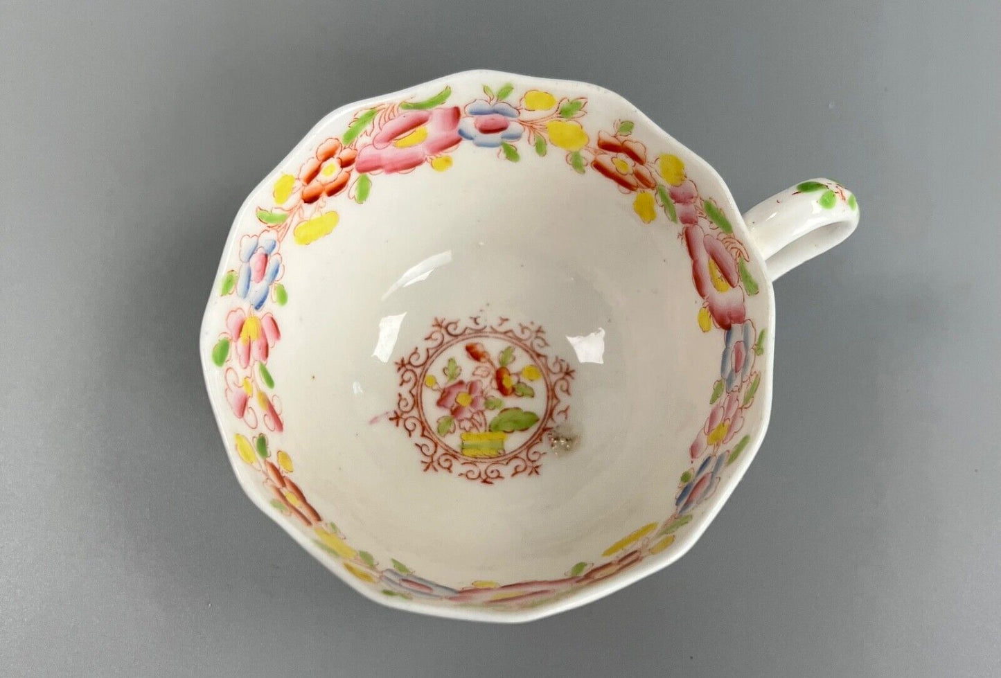 An early 19thc New Hall tea cup and saucer in pattern number 3203