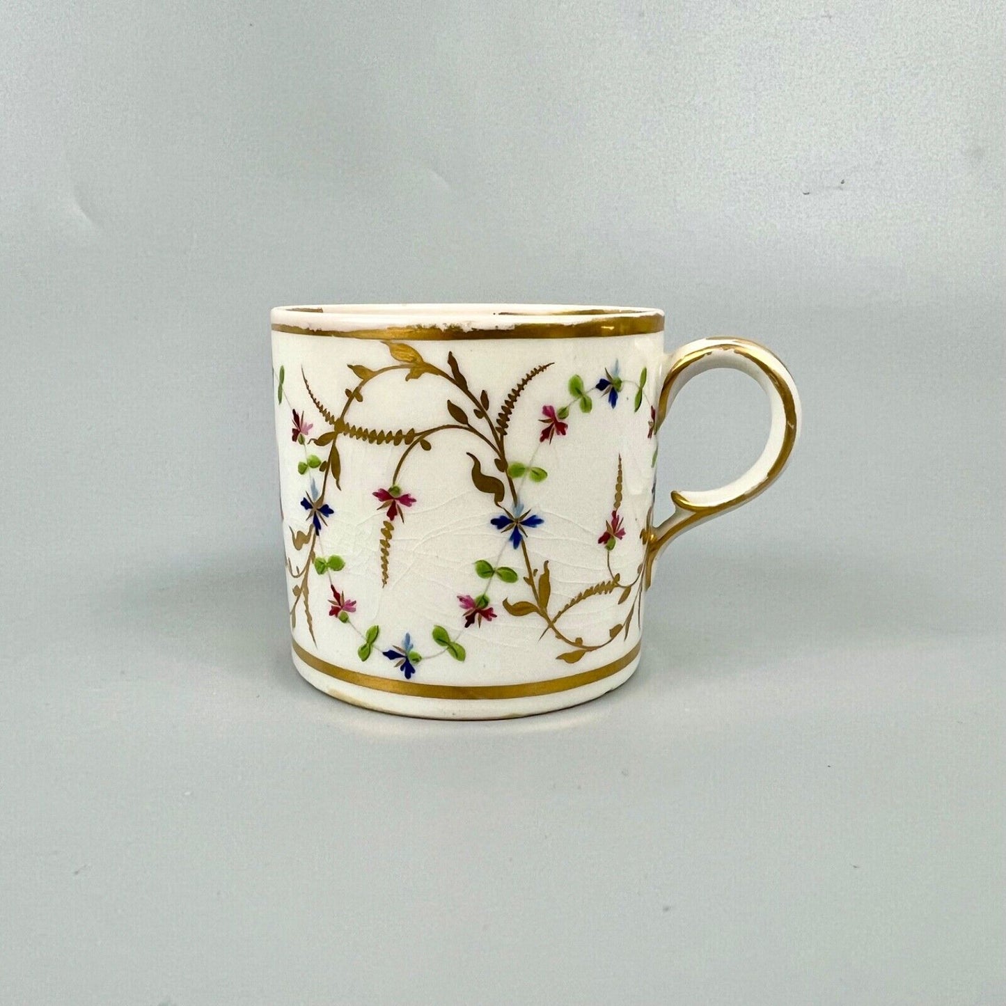 A late 18thc Derby Porcelain cup in pattern number 552. Puce mark. c1795