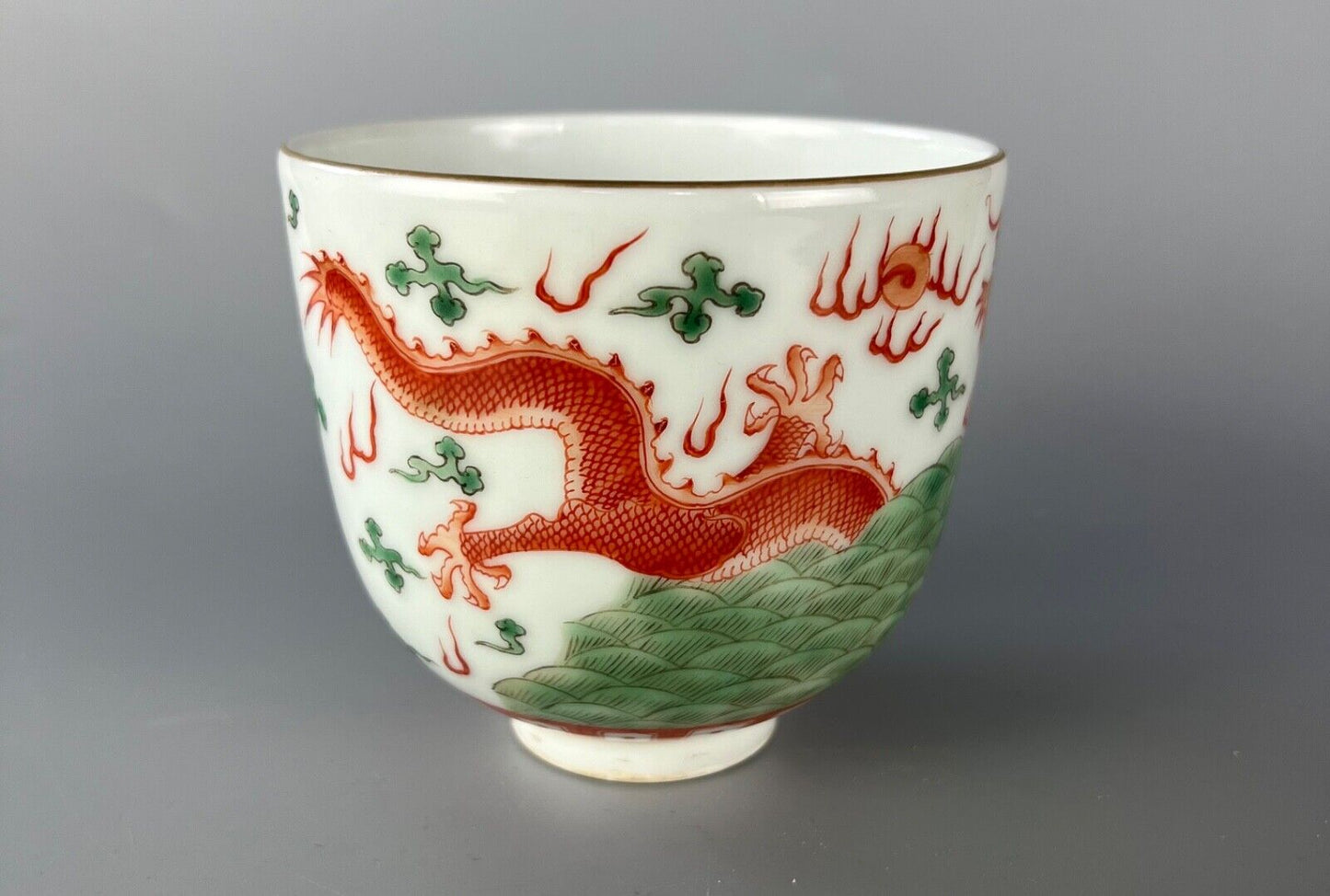 A 20thc Chinese porcelain painted bowl, depicting the dragon & flaming pearl.