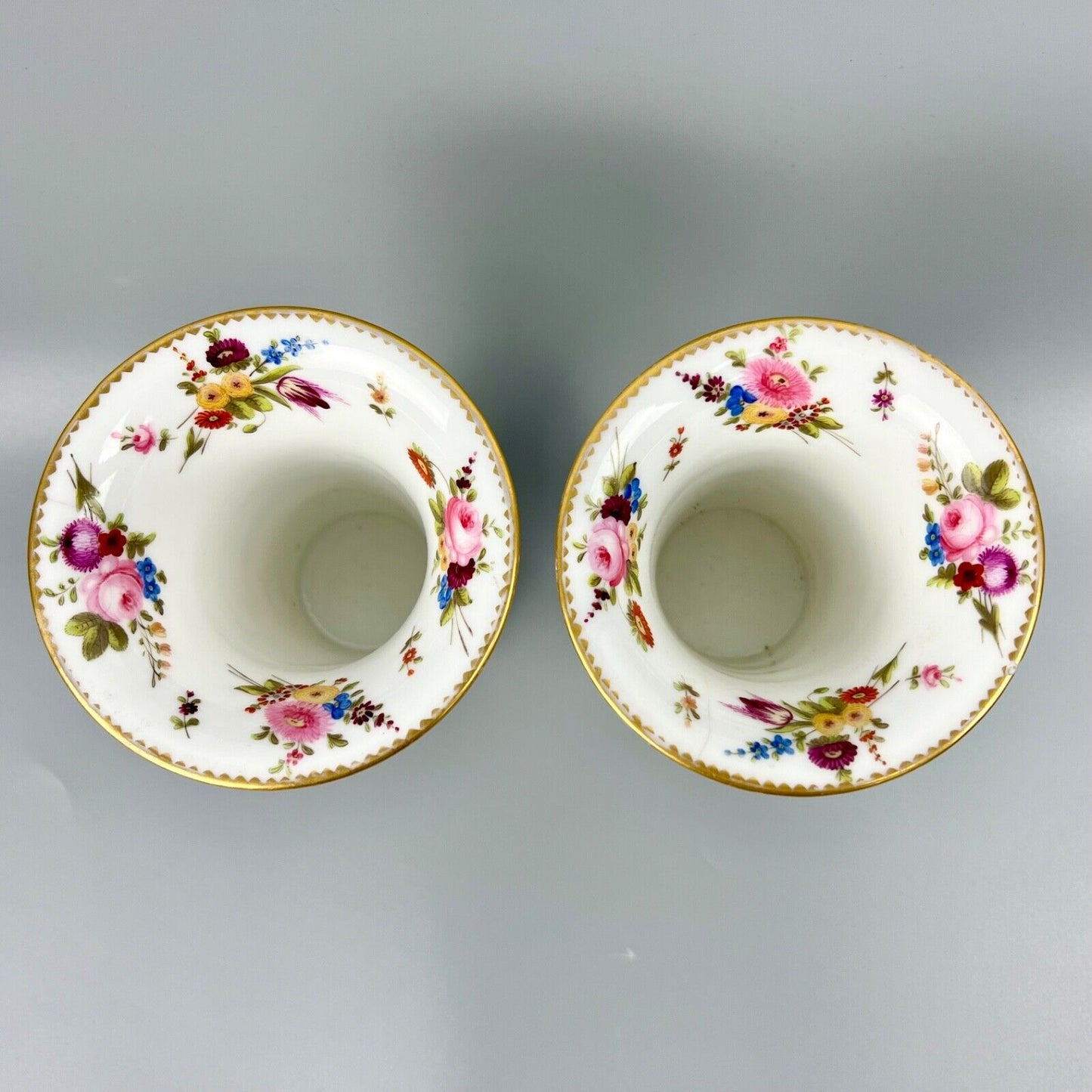 A pair of early 19th century vases in Swansea style c1810