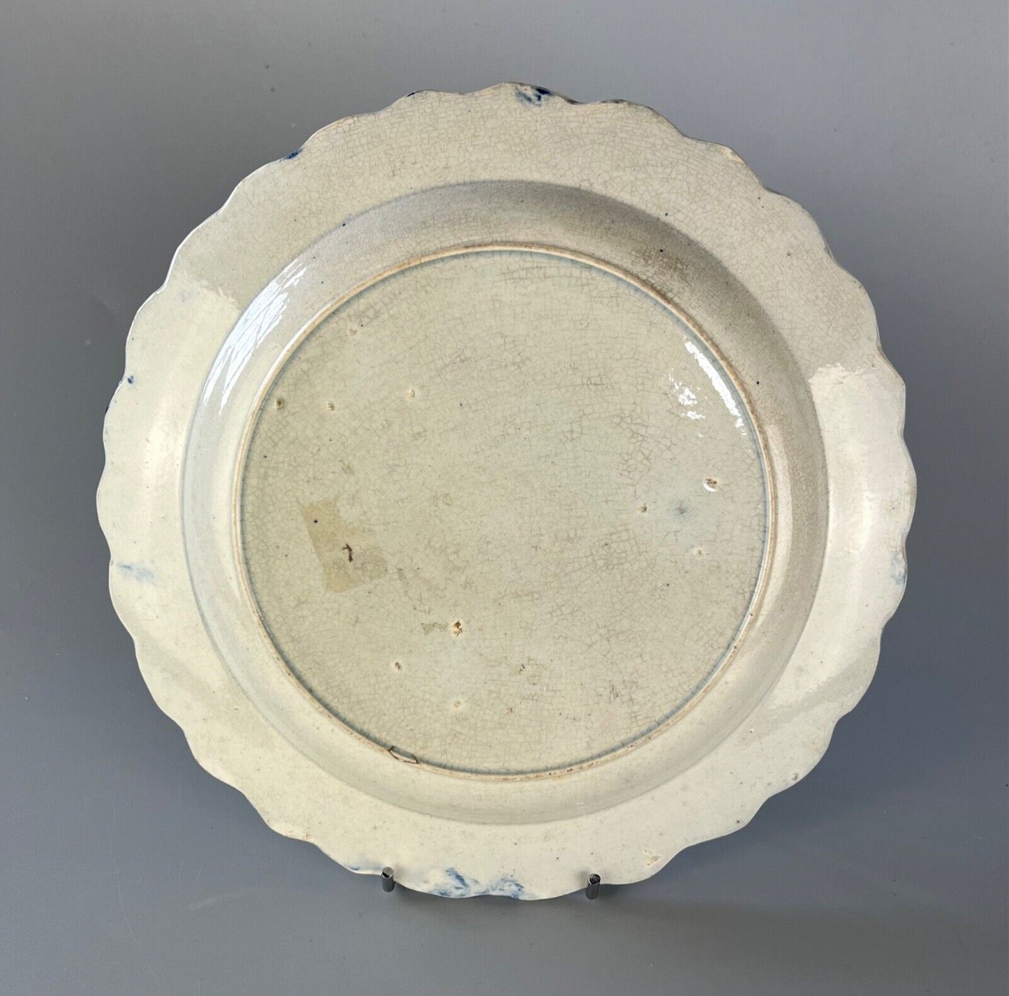 A c.1790-1810 shell moulded pearlware plate with painted floral decoration.#2