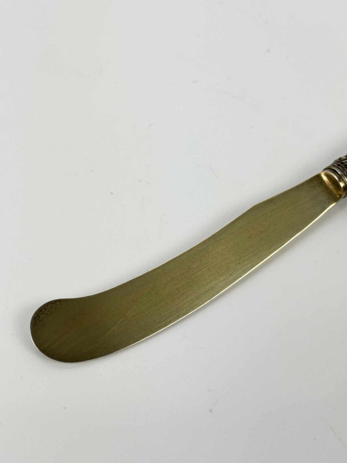 A sterling silver-gilt knife & fork set-the silver c.1863, the porcelain c.1760