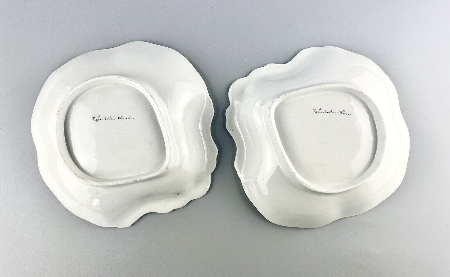 A pair of Chamberlain Worcester armorial shell-shaped dishes c.1810