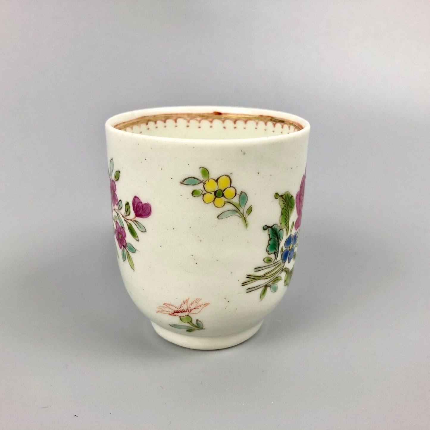 A Worcester famille rose-style coffee cup. c.1765