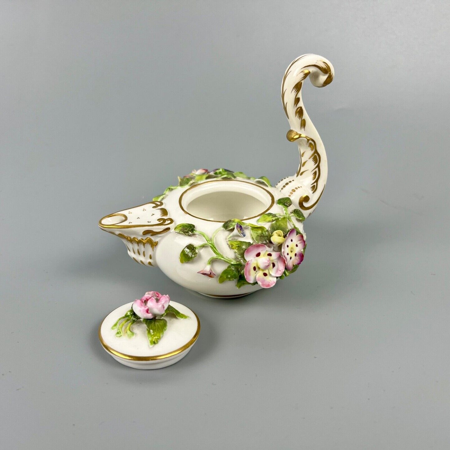 A mid 19thc Derby (Stevenson Hancock-puce version mark) miniature teapot c.1863