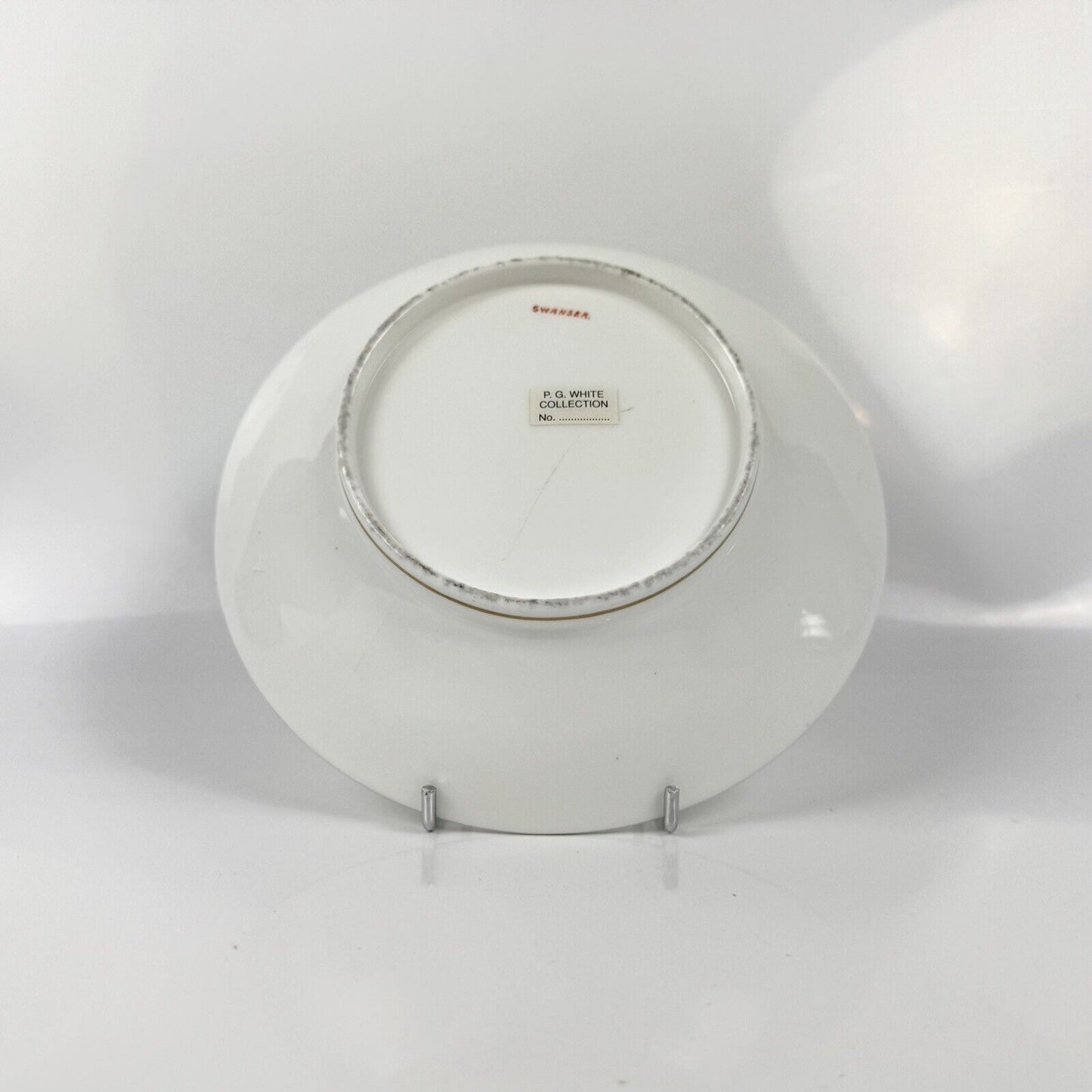 A good Swansea breakfast cup and saucer with floral decoration c1814-7