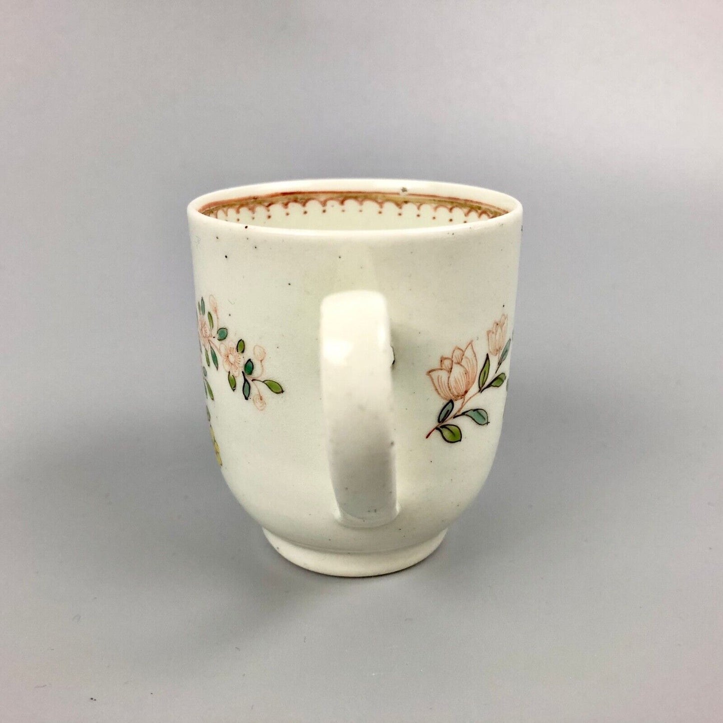 A Worcester famille rose-style coffee cup. c.1765