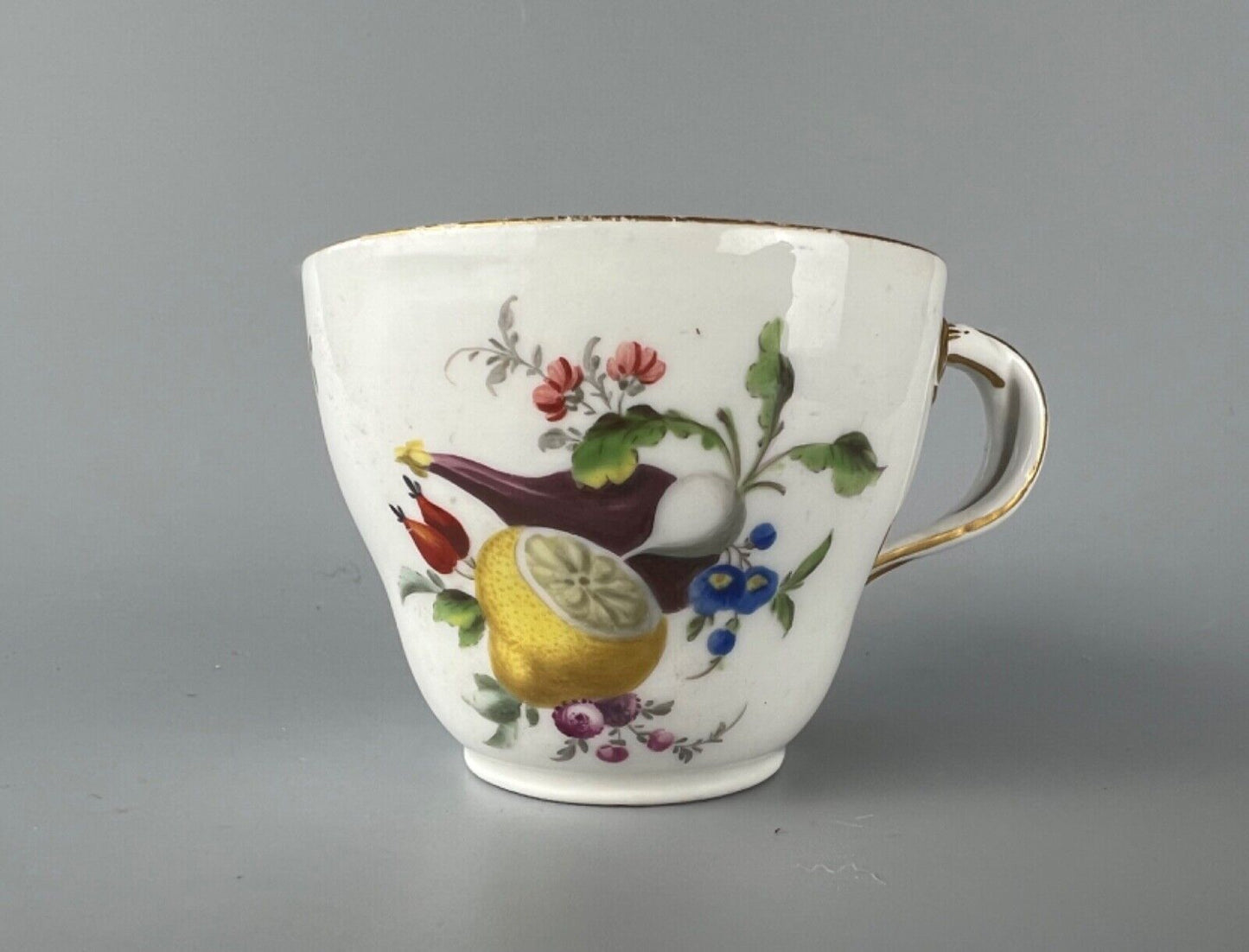 A set of four Meissen Marcolini Period c.1800 bifurcated-handle coffee cups.
