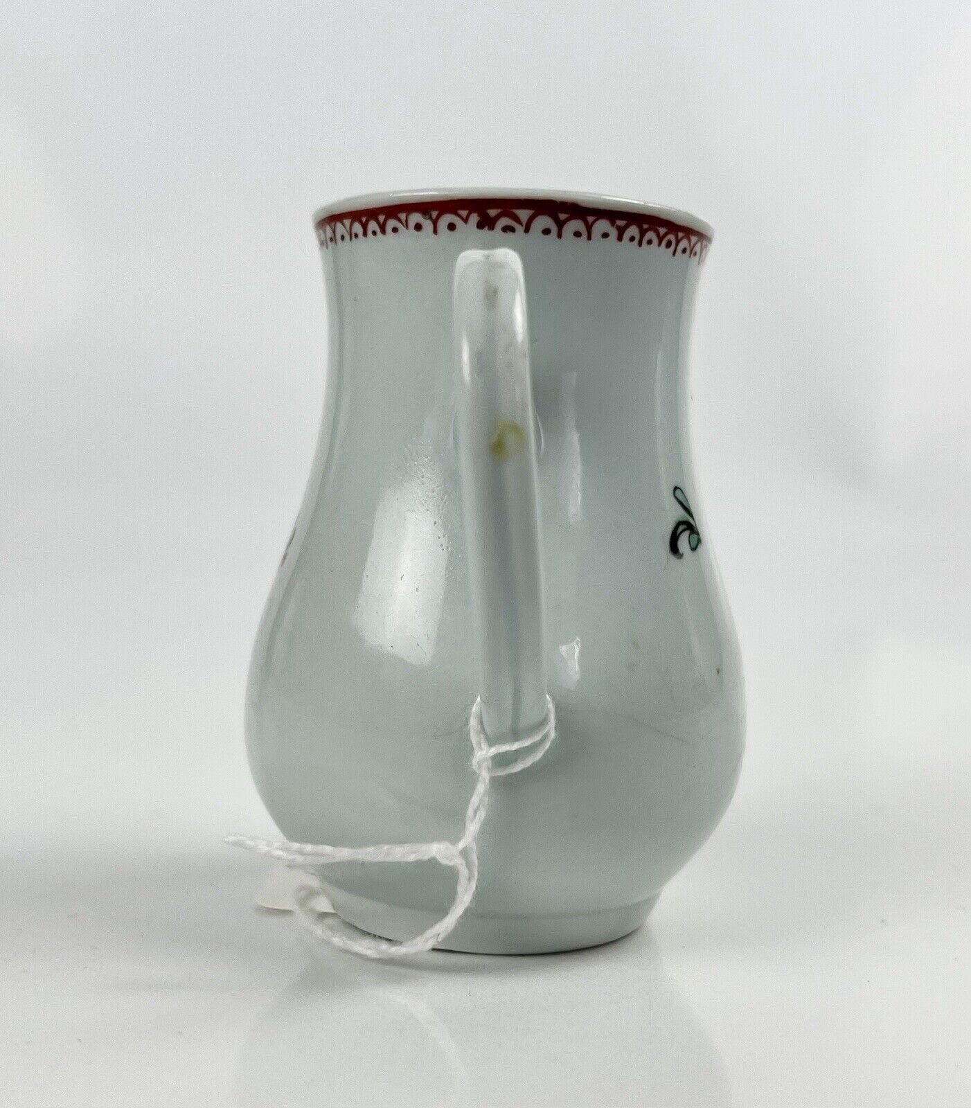 A Philip Christian Liverpool floral-decorated sparrowbeak jug. c.1770