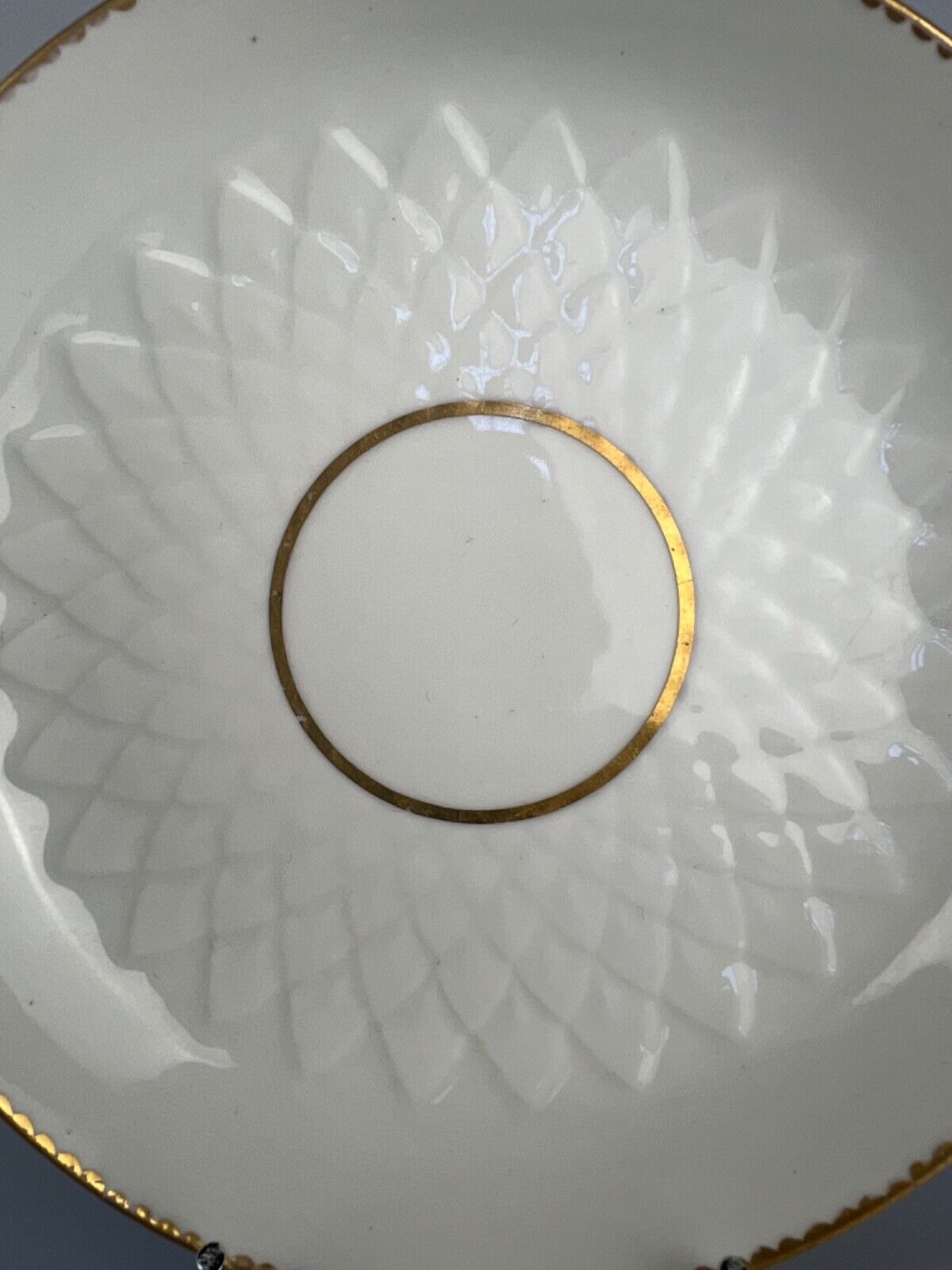 An artichoke-moulded 18thc Derby saucer dish. Puce Derby mark.