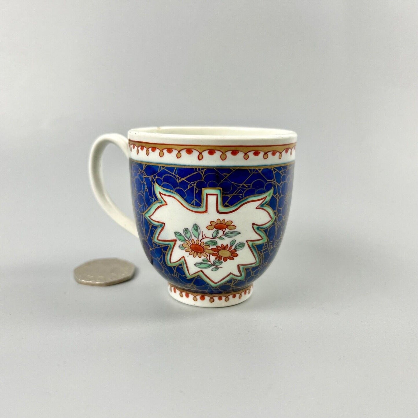 A rare 1st Period Worcester coffee cup in an unusual pattern c.1765-70