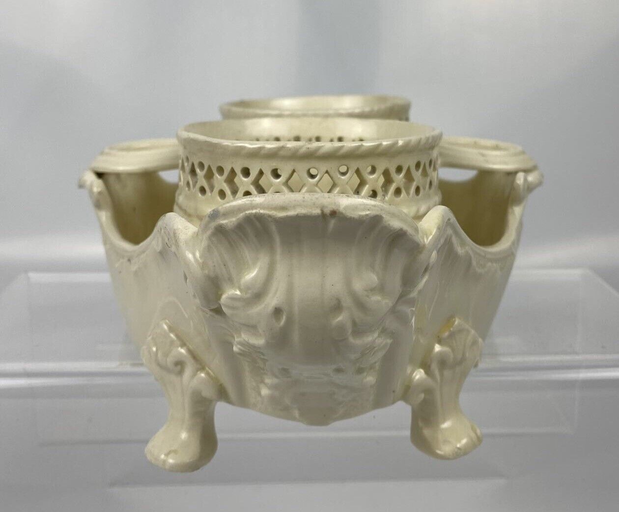 Continental creamware oil and vinegar cruet with relief decoration. c.1790-1810