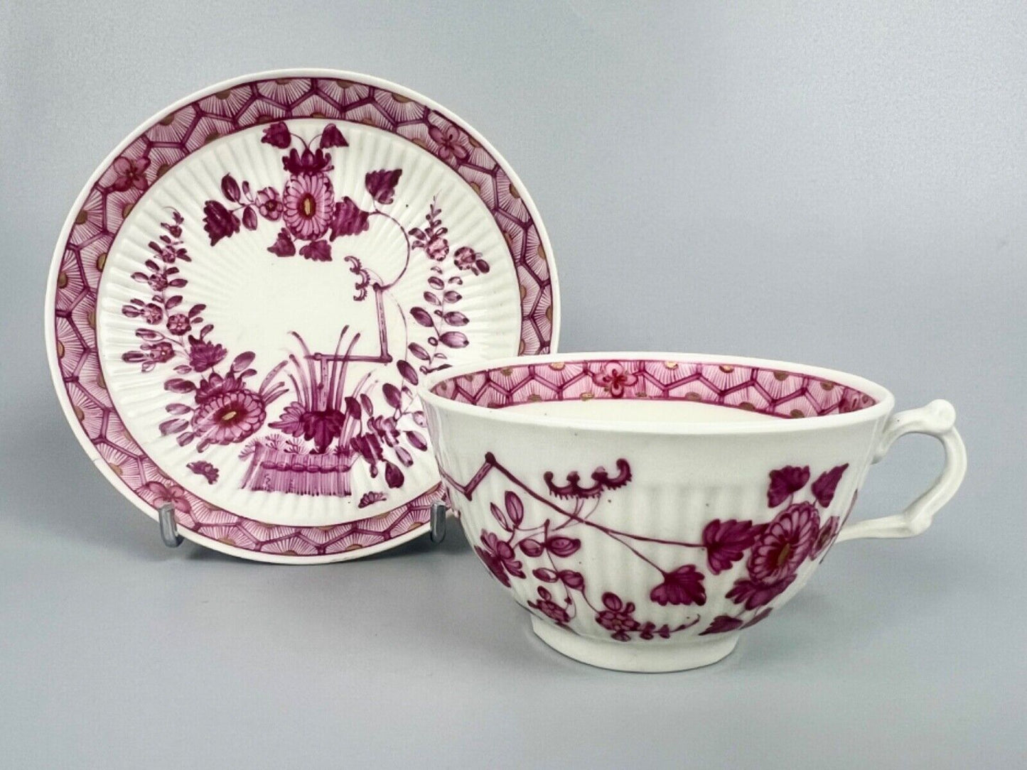 A rare Worcester reeded teacup and saucer painted in Meissen style. c.1772