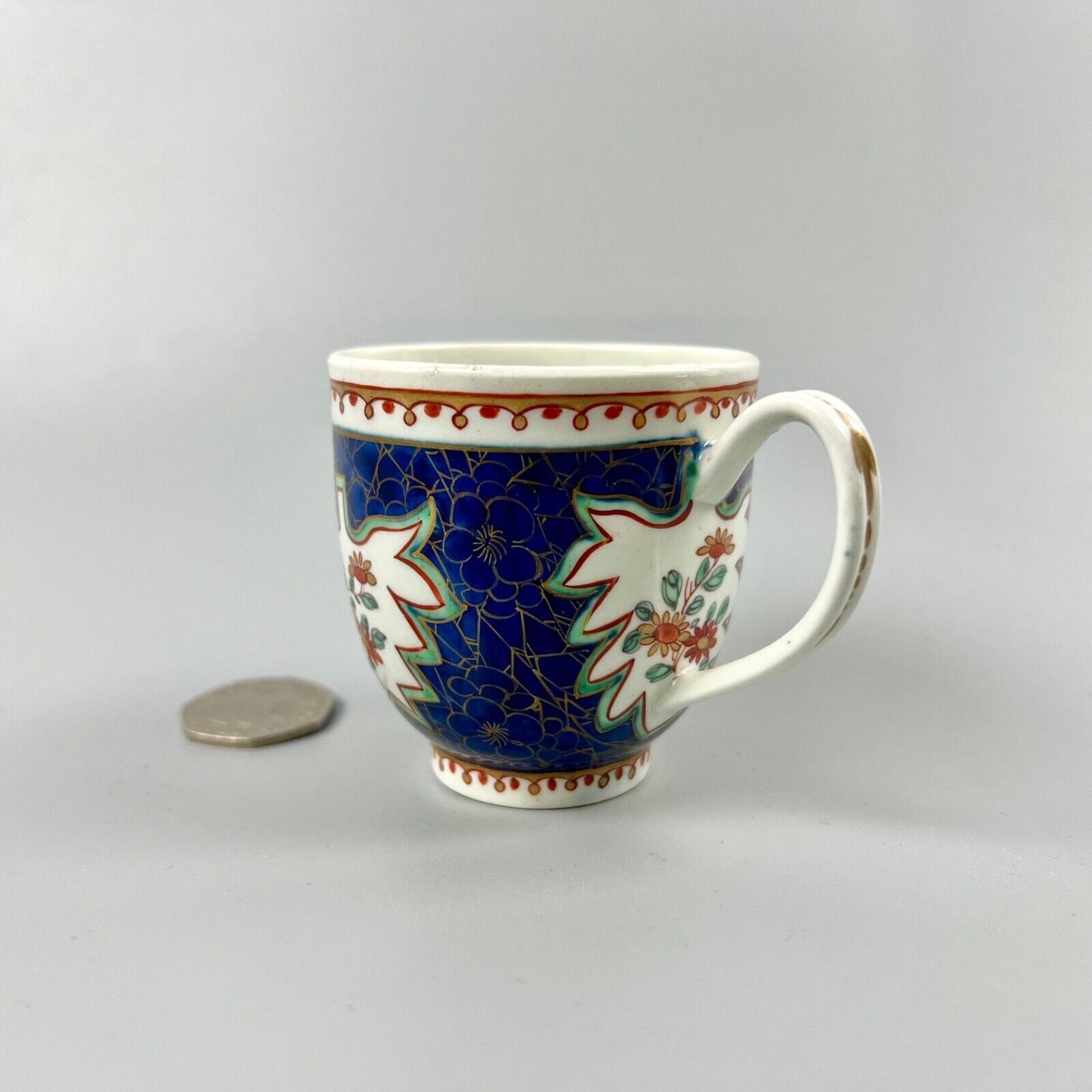 A rare 1st Period Worcester coffee cup in an unusual pattern c.1765-70